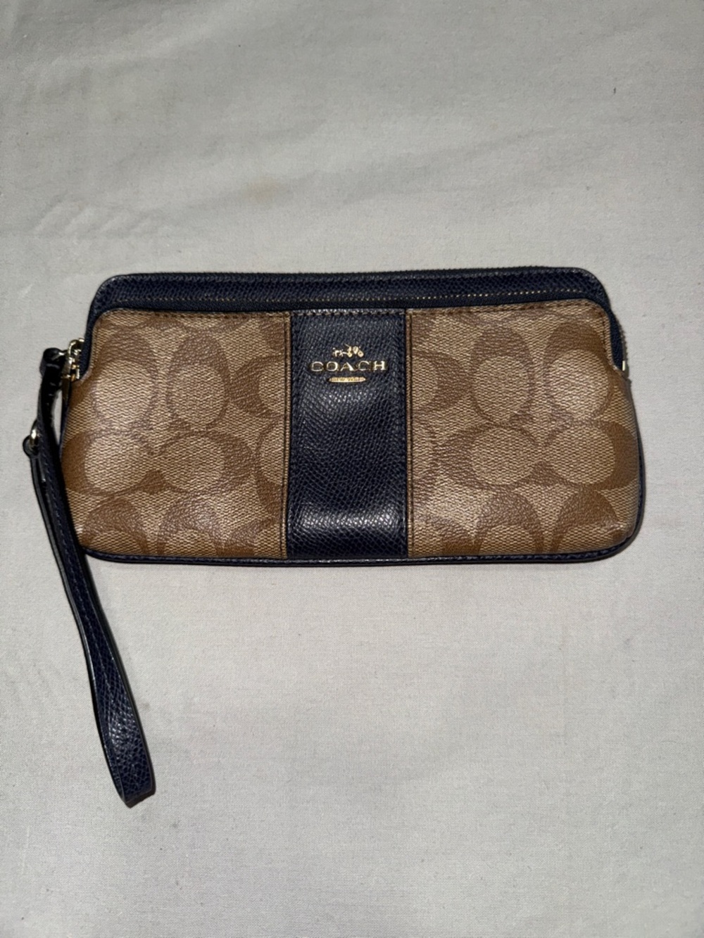 Coach Brown Signature Canvas Wristlet with Navy Blue Trim